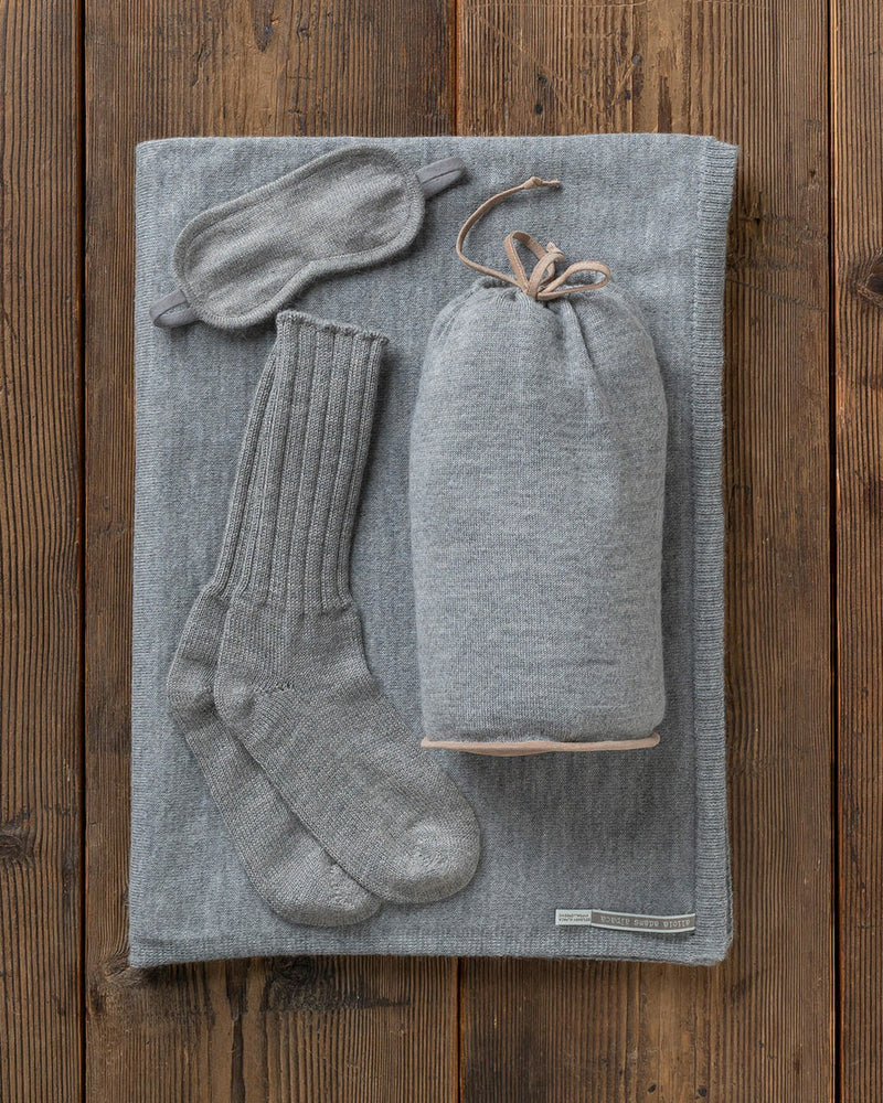 Alicia Adams Alpaca Globetrotter Travel Blanket Set, alpaca socks, alpaca travel blanket, travel kit with blanket and eyemask, light grey and tan plane travel set
