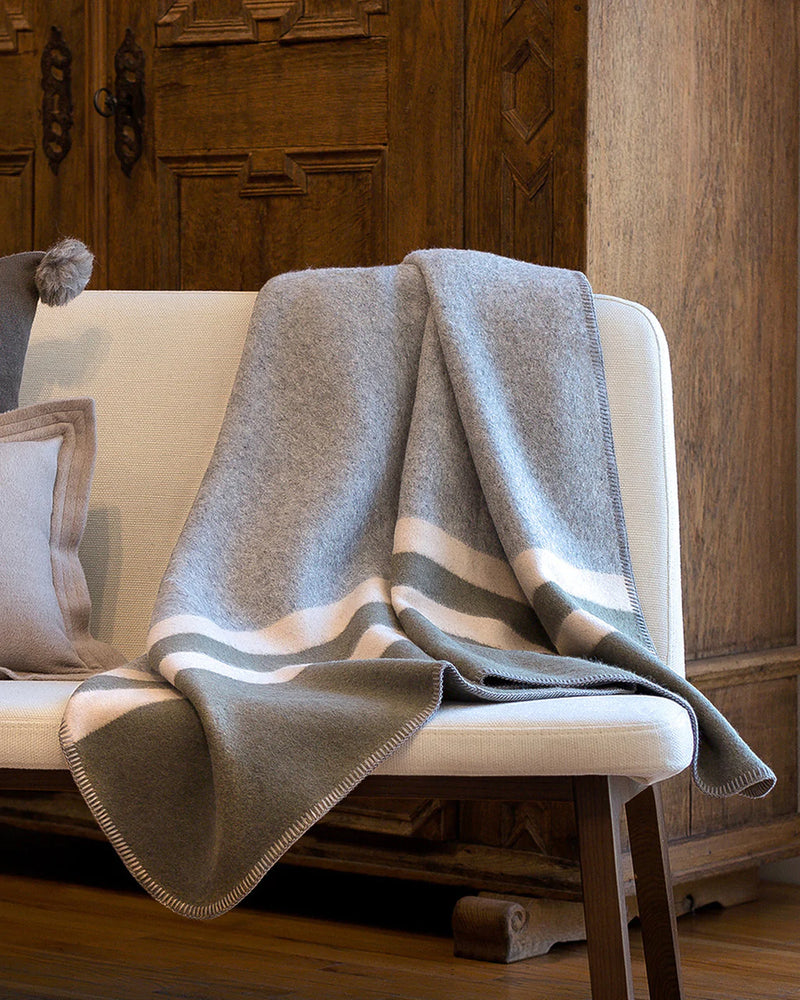Alicia Adams Alpaca Field Blanket, alpcaca throw blanket in room setting, ecofriendly recycled alpaca and wool handstitched blanket, famous designer, today show alpaca blanket, alicia adams today show